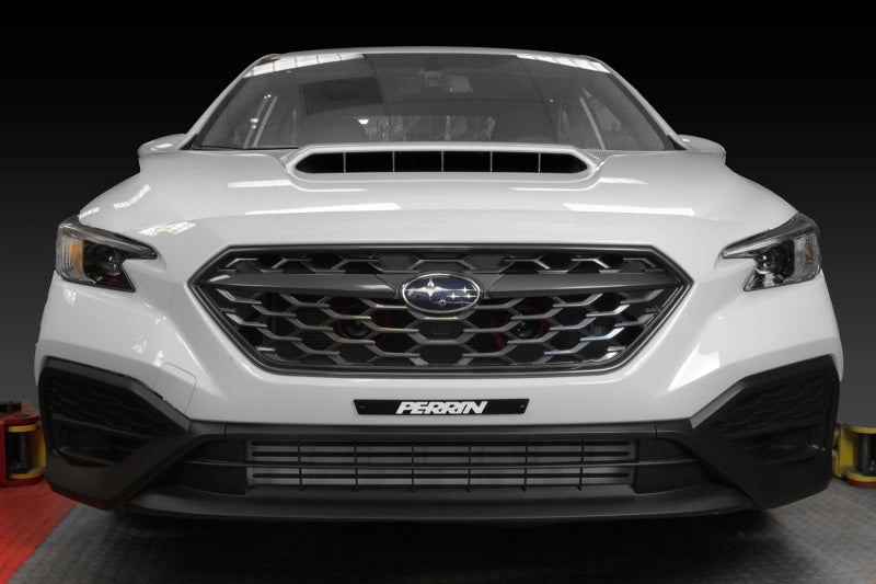 Black license plate delete for 2022-2025 Subaru WRX by Perrin, JDMuscle, mounted on the vehicle's rear.