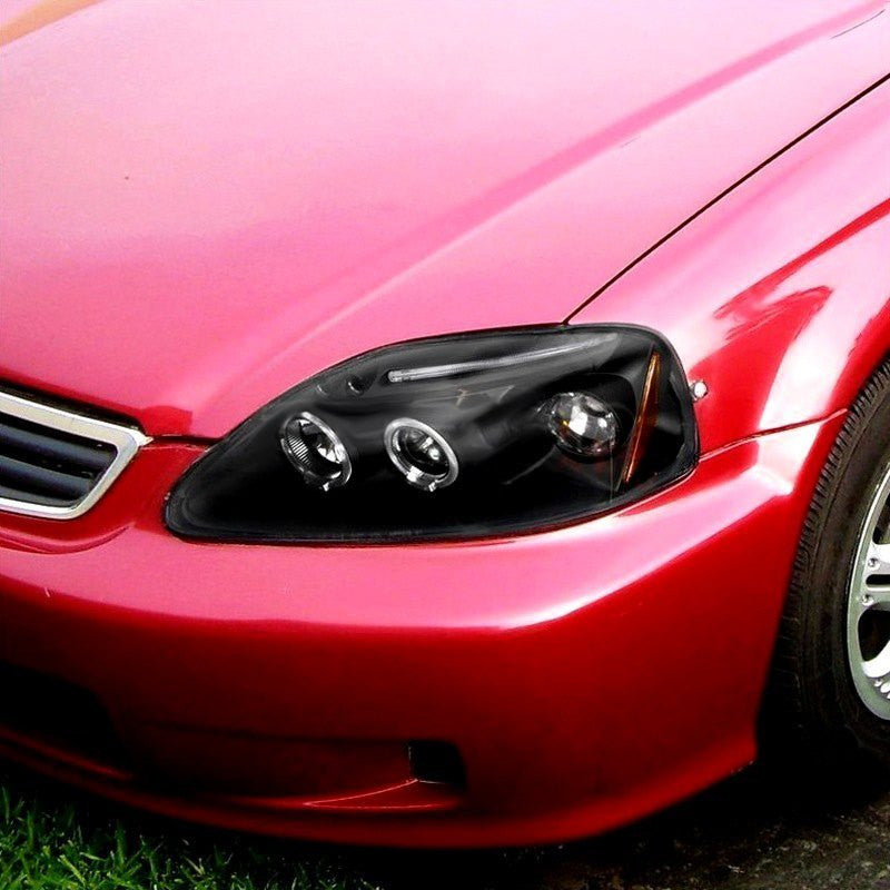 Dual halo LED projector headlights for 1999-2000 Honda Civic in black, featuring modern design and high visibility.
