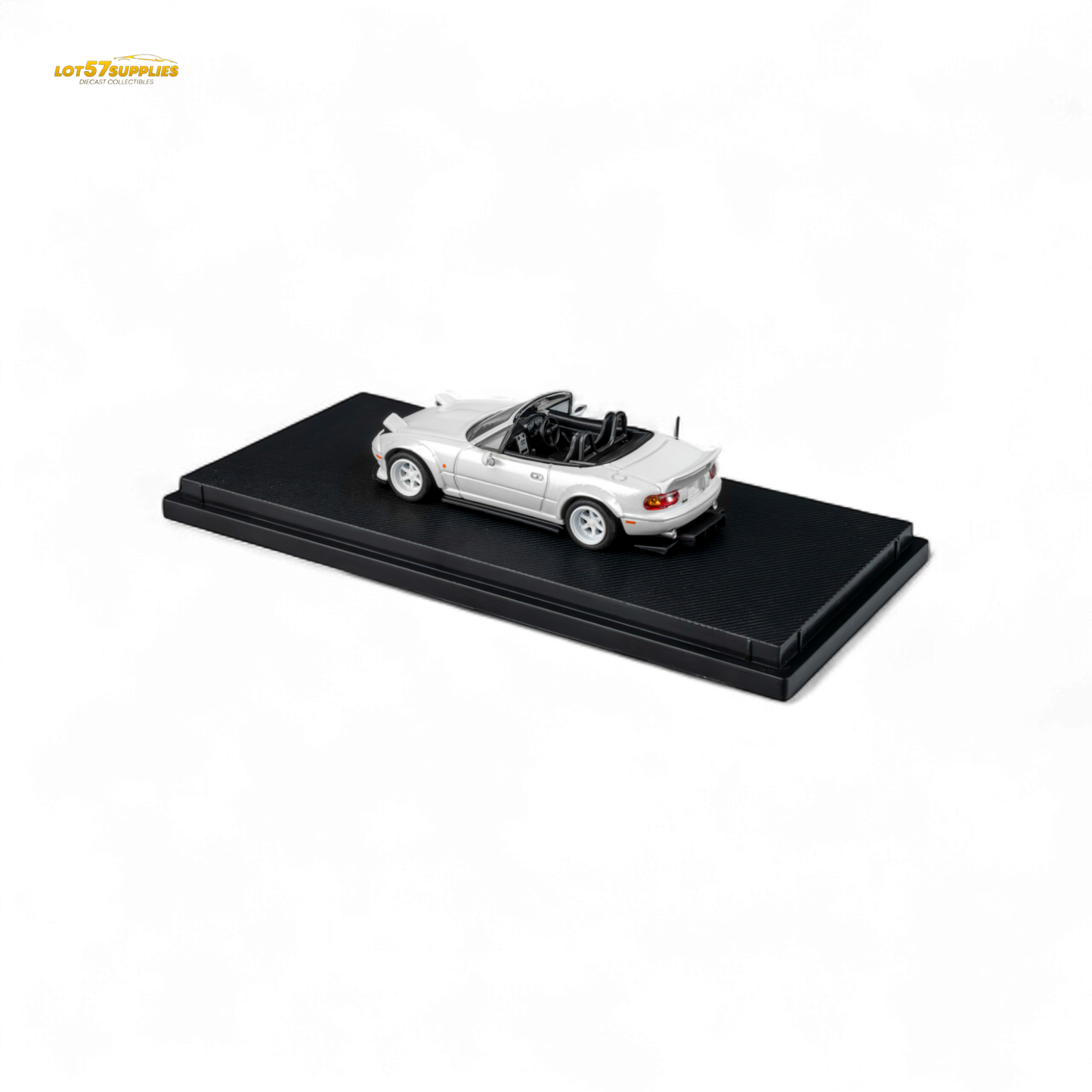 Metallic white Mazda Microturbo Custom MX5 diecast car by Lot57Supplies, detailed 1:64 scale model with Rocket Bunny design.