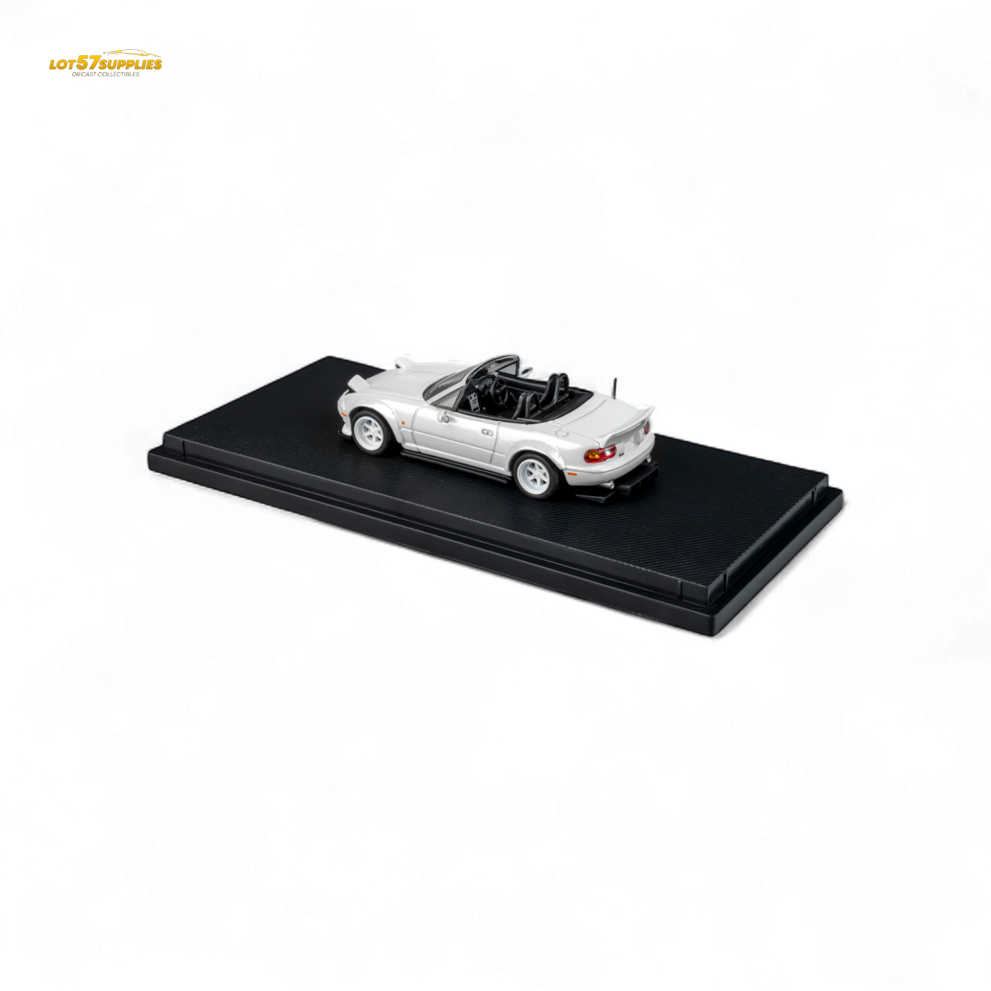 Metallic white Mazda Microturbo Custom MX5 diecast car by Lot57Supplies, detailed 1:64 scale model with Rocket Bunny design.