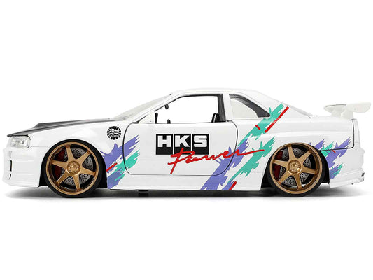 2002 Nissan Skyline GT-R (R34) RHD (Right Hand Drive) "HKS Power" White with Carbon Hood and Graphics "JDM Tuners" Series 1/24 Diecast Model Car by Jada