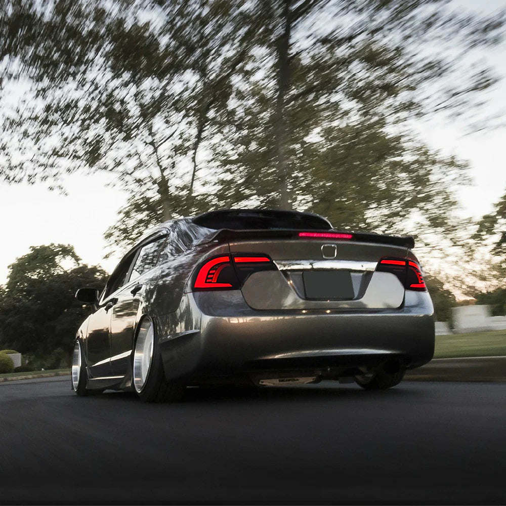 NTXGlow LED tail lights for Honda Civic Sedan 2006-2011 with clear lens, showcasing sleek automotive lighting design.