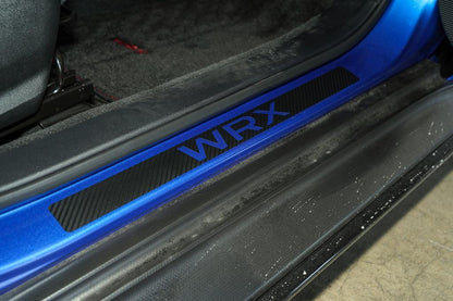 3D carbon fiber door sill accent overlay for 2015-2025 Subaru WRX/STI interior, by StickerFab, shown on vehicle door sill.