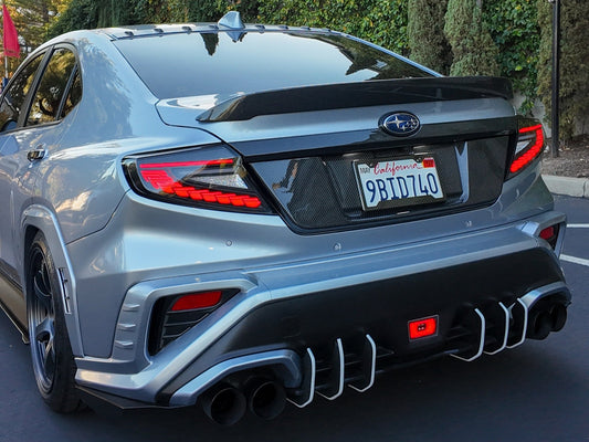 OLM Phantom-Spec LED taillights with clear lens and red optic for 2022+ Subaru WRX, showing the sleek tail light design.