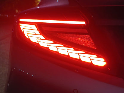 OLM Phantom-Spec LED taillights with smoke lens and red optics for 2022+ Subaru WRX, showing sleek tail light design and smoked lens.