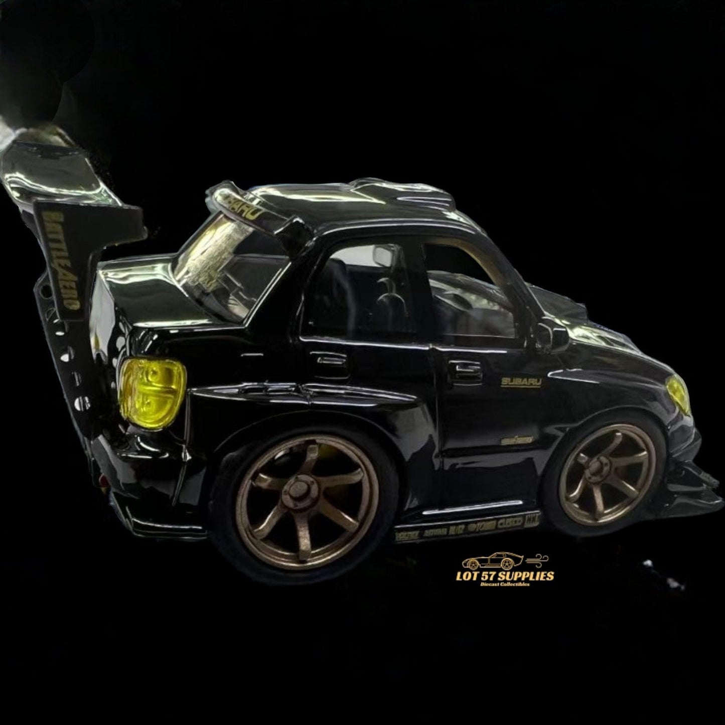 Black and gold 1:64 scale Subaru Impreza WRX STI model car by Lot57Supplies Diecast Shop, featuring detailed exterior design.