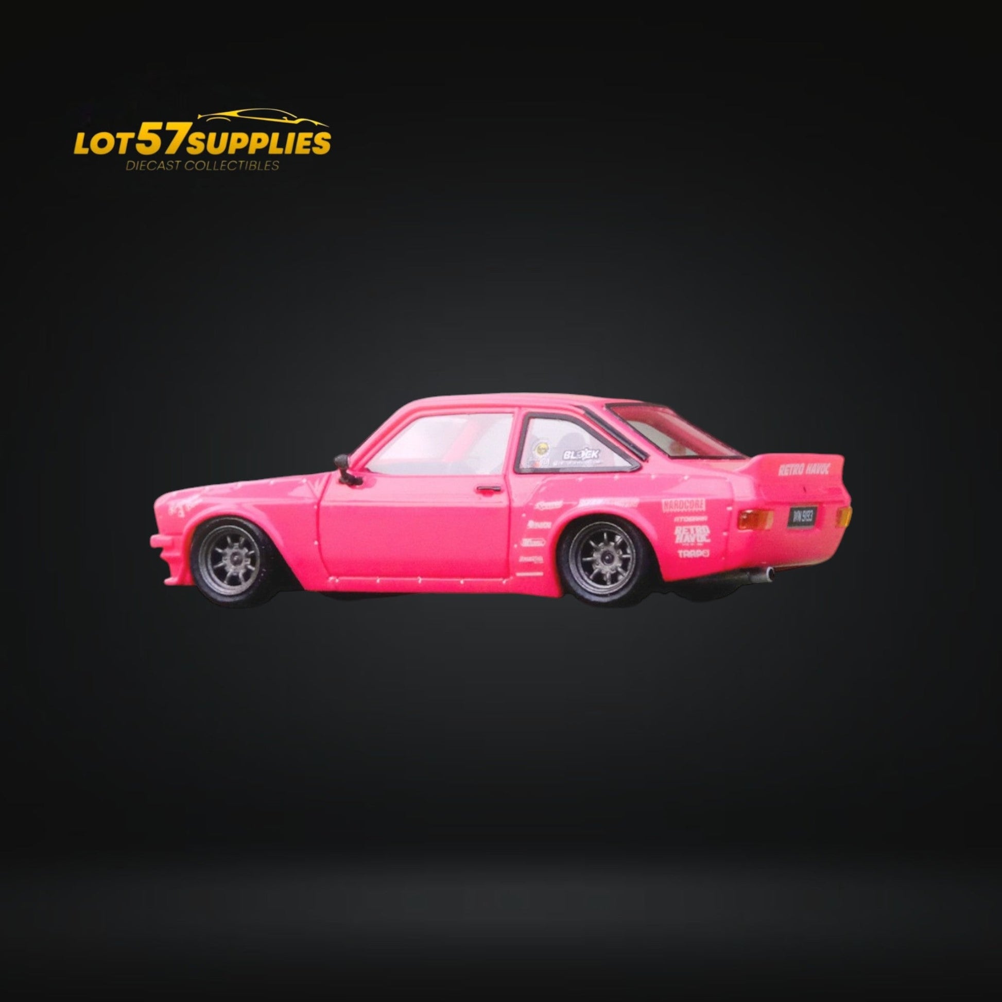 Miniature pink Ford Escort MK2 diecast model by Inno64, featuring retro Pandem "Emotion" design, 1:64 scale.