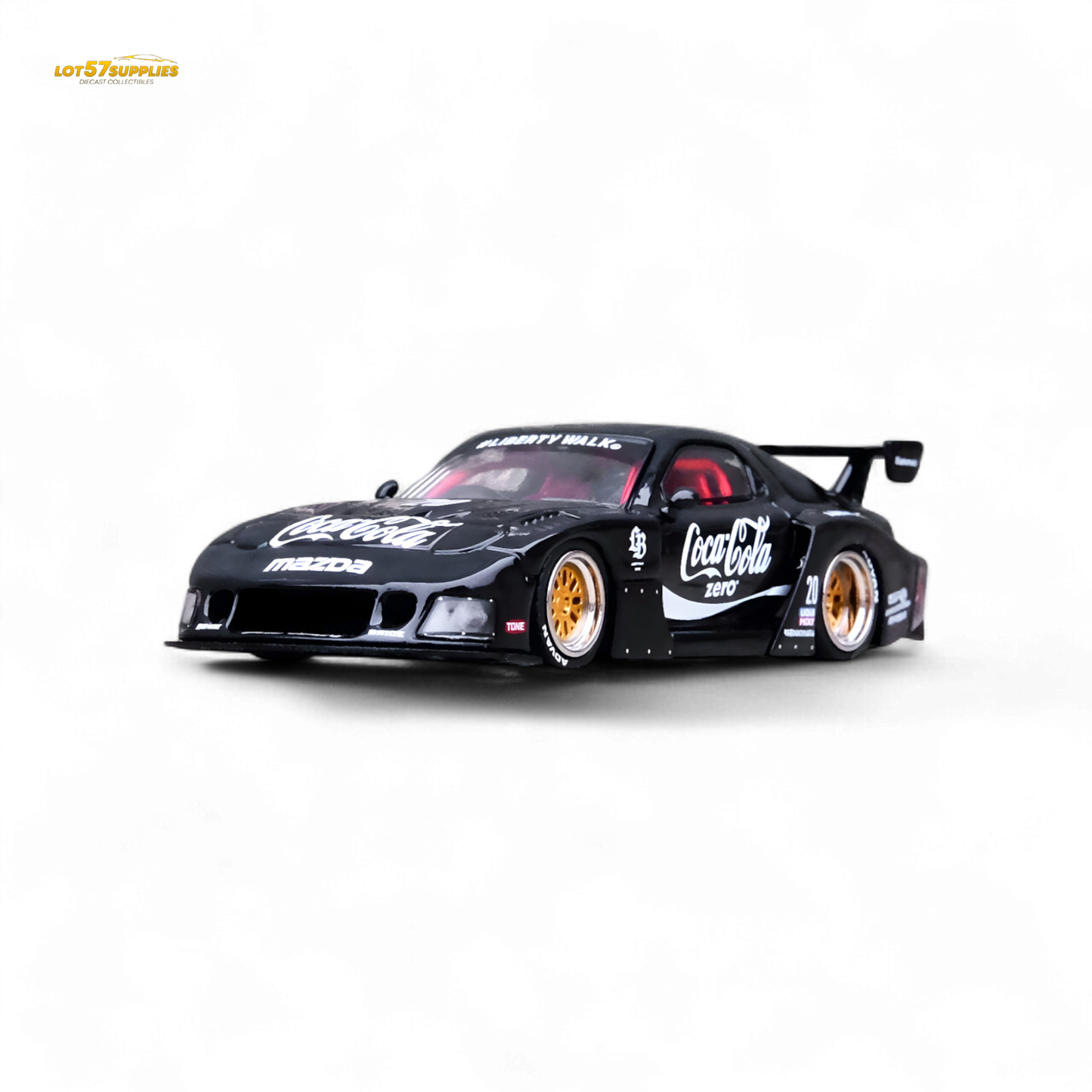 Black Inno64 Mazda RX-7 LBWK diecast model in 1:64 scale, detailed Mazda car featuring sleek design and authentic branding.