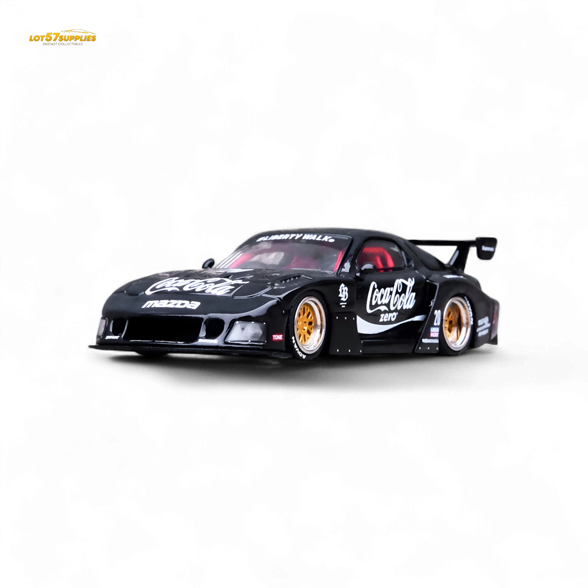 Black Inno64 Mazda RX-7 LBWK diecast model in 1:64 scale, detailed Mazda car featuring sleek design and authentic branding.
