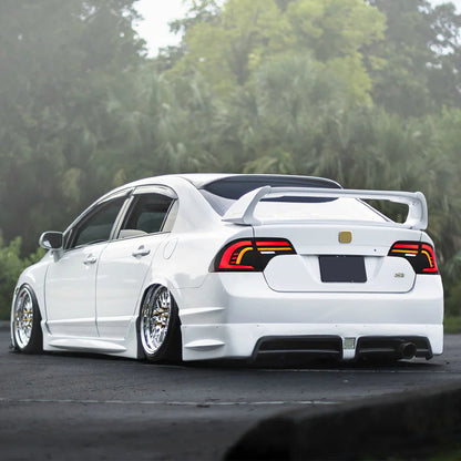 NTXGlow LED tail lights for Honda Civic Sedan 2006-2011, clear lens, showcasing sleek, modern automotive lighting design.