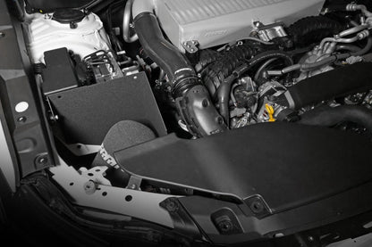 JDMuscle Perrin 22-25 WRX cold air intake in black, showing the sleek, high-performance automotive intake system with intake pipe and filter.