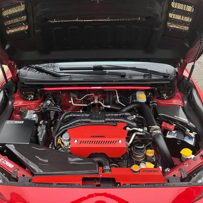 Subaru WRX/STI 2015-2021 600 Series Battery Mount by MeLe Design Firm, showing black metal battery hold-down bracket and mounting hardware.