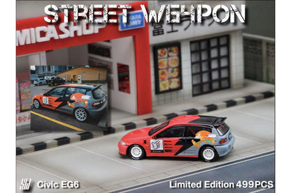 Diecast Honda Civic EG6 street weapon model with Sonic livery in 1:64 scale, featuring detailed design and vibrant colors.