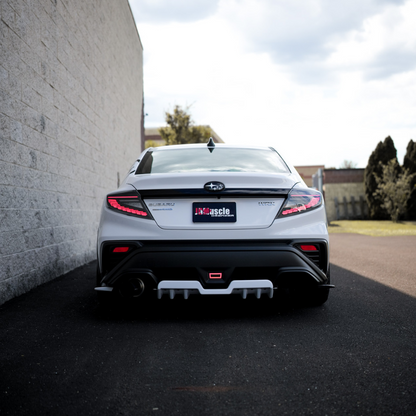 JDMuscle 22-25 WRX Doragon LED tail lights showing red and clear lenses on a Subaru WRX tail light assembly.