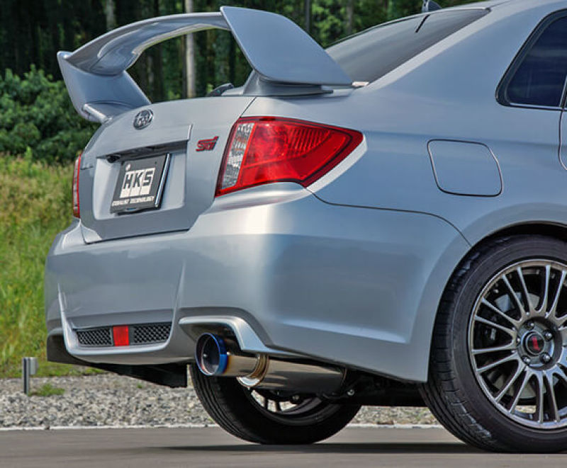 FR SPORT HKS Racing Muffler Impreza exhaust system kit showing polished muffler and piping on a car engine.