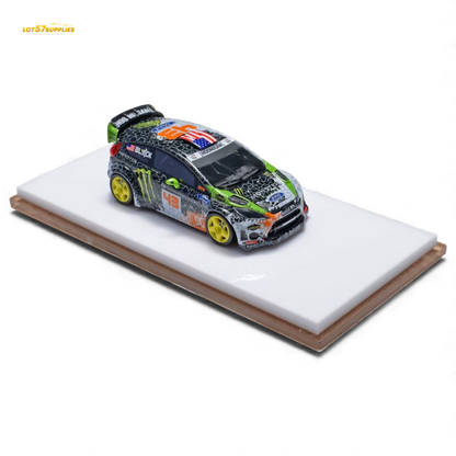 Miniature Ford Fiesta diecast model in Gymkhana livery, 1:64 scale, featuring detailed design and vibrant racing graphics.