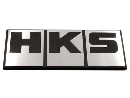 HKS Silver Block Logo emblem decal for automotive branding, featuring the HKS brand name in silver block lettering.