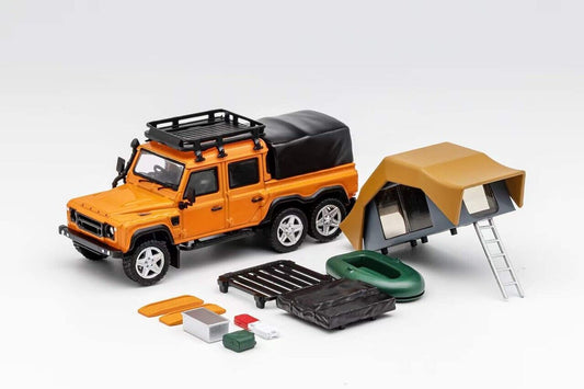 Orange Land Rover Defender 6x6 diecast model by Lot57Supplies, showcasing detailed camping modification in 1:64 scale.