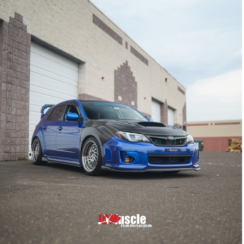 JDMuscle front carbon fiber lip for 2011-2014 Subaru WRX/STI, enhances aerodynamics and aggressive styling