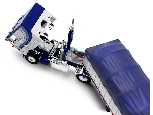 Peterbilt 352 COE 110" Sleeper and 53' Wilson Roadbrute Flatbed Trailer with Covered Wagon White with Blue Stripes 1/64 Diecast Model by DCP/First Gear