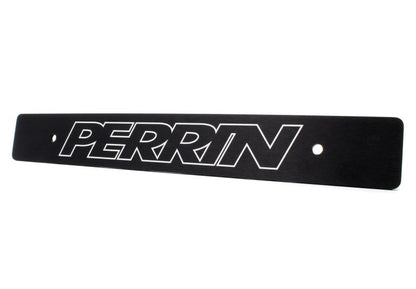 JDMuscle Perrin reversible black license plate delete for Subaru WRX, STI, and BRZ models, showing sleek black finish and mounting area.