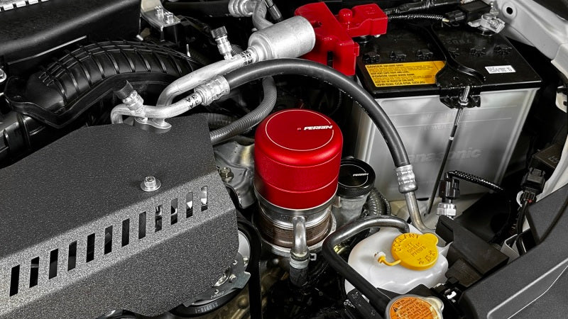 Red PERRIN oil filter cover for WRX, BRZ, 86, and GR86 by JDMuscle