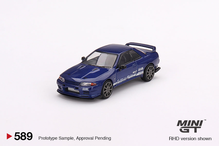 Mini-GT Nissan Skyline GT-R R32 diecast model in metallic blue, 1:64 scale, detailed Nissan sports car from Lot57Supplies Diecast Shop