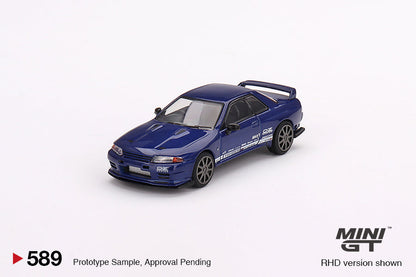Mini-GT Nissan Skyline GT-R R32 diecast model in metallic blue, 1:64 scale, detailed Nissan sports car from Lot57Supplies Diecast Shop