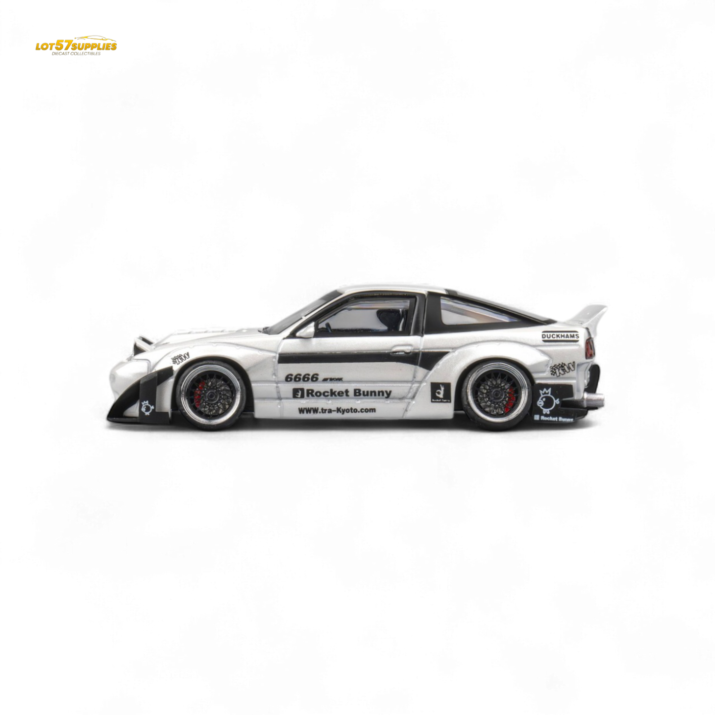 White Nissan 180SX MicroTurbo diecast model with Pandem Rocket Bunny body kit, detailed miniature car collectible.