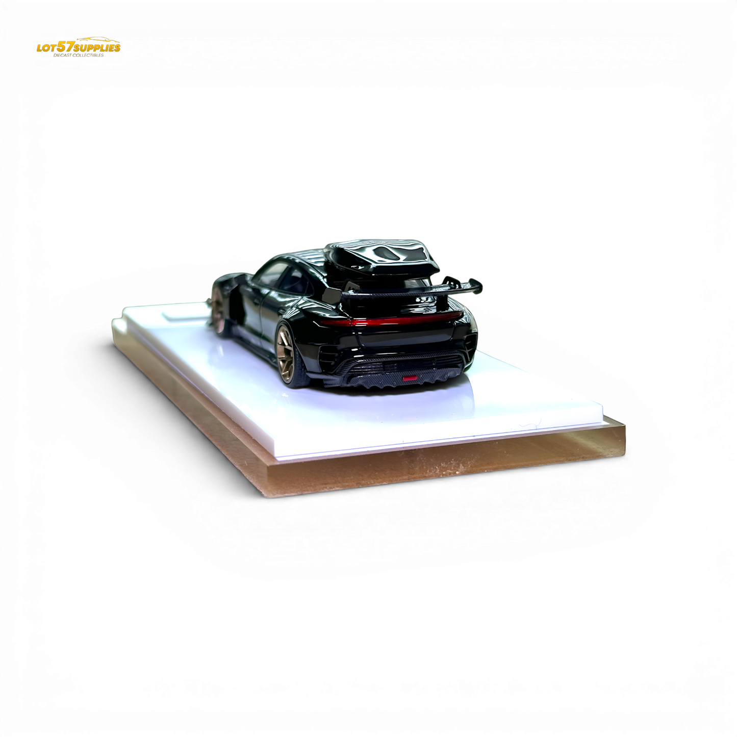 Black Porsche Taycan diecast model with roof box, 1:64 scale, detailed miniature car by Lot57Supplies Diecast Shop.