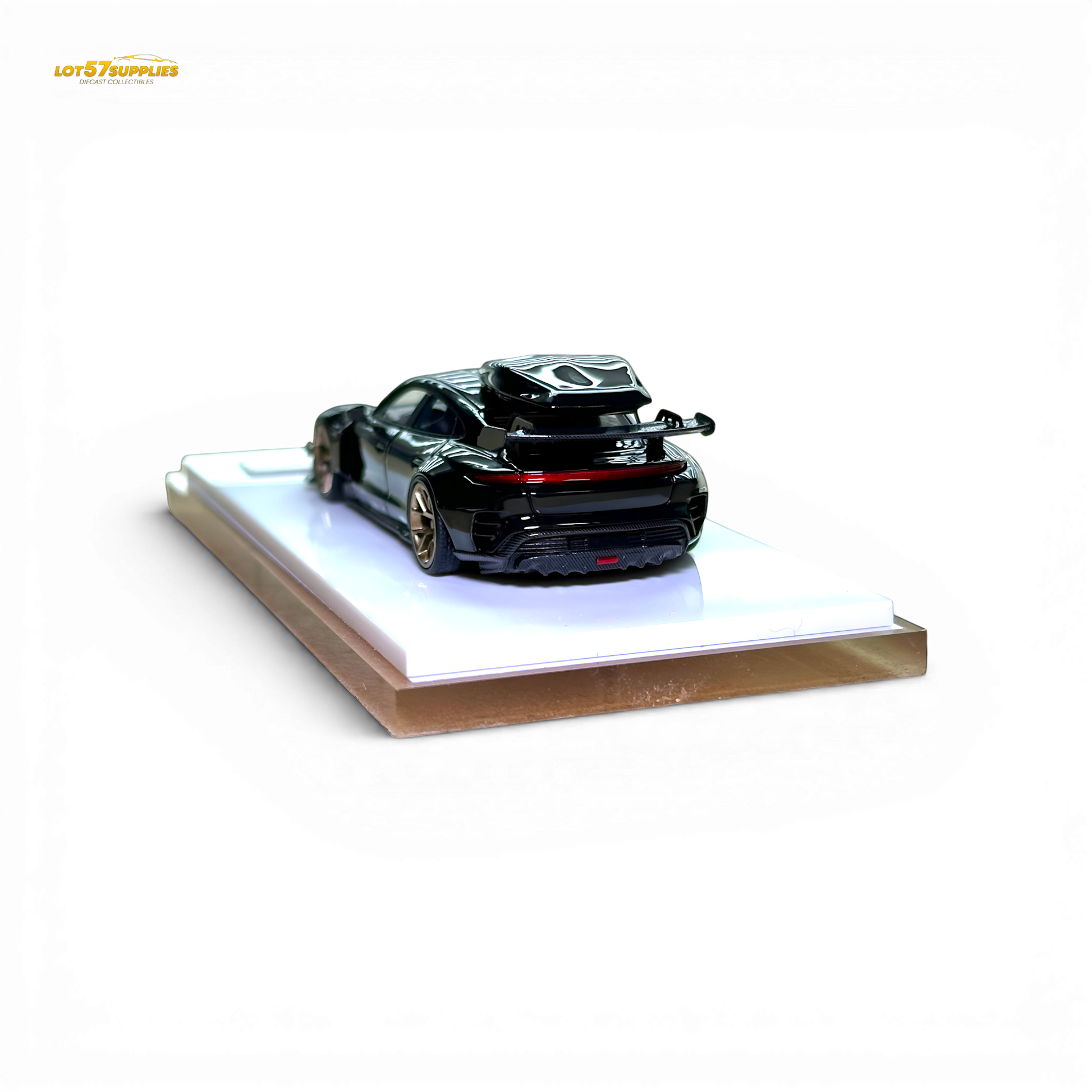 Black Porsche Taycan diecast model with roof box, 1:64 scale, detailed miniature car by Lot57Supplies Diecast Shop.