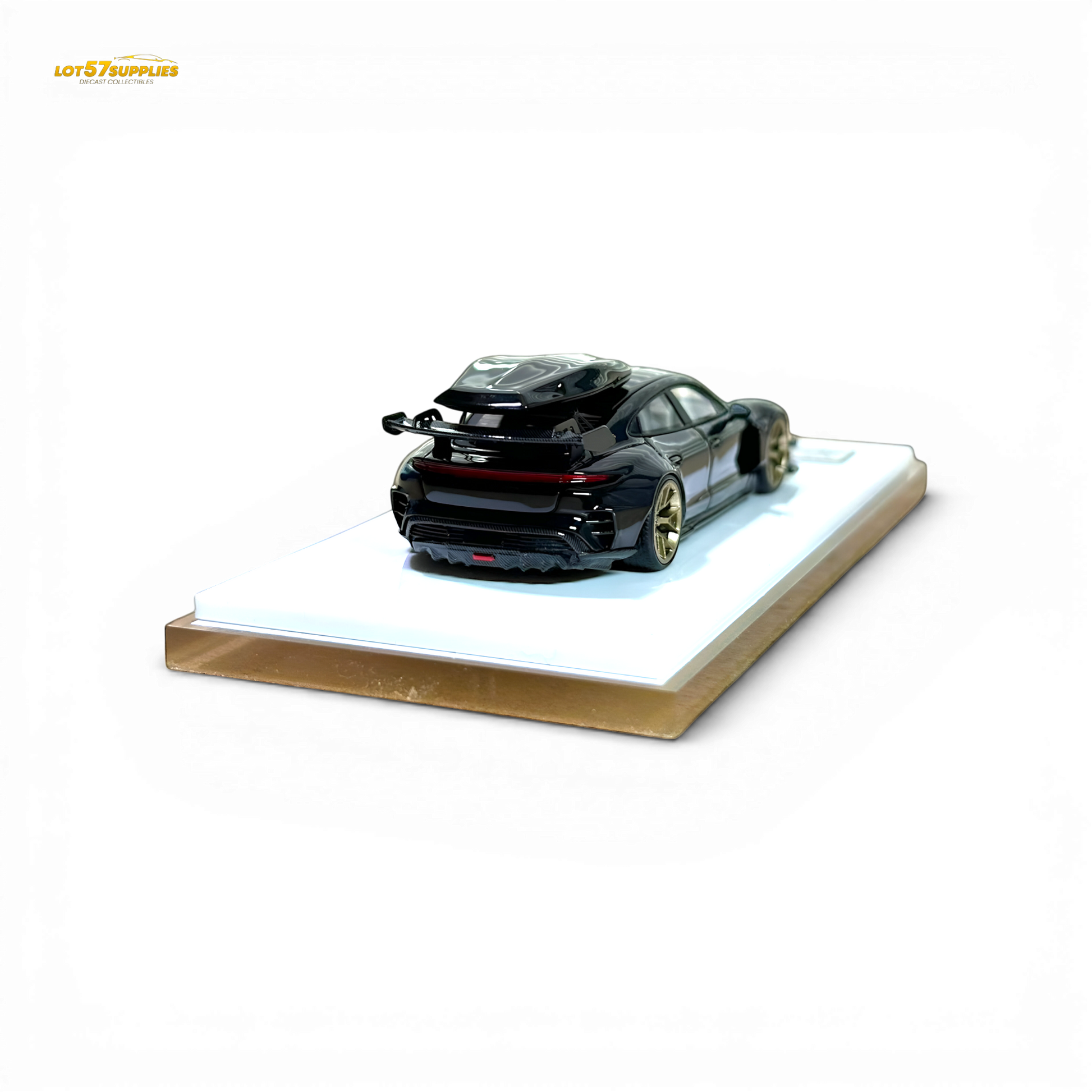 Black Porsche Taycan 1:64 scale diecast car with roof box, detailed model from Lot57Supplies Diecast Shop.