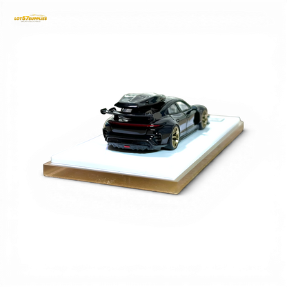Black Porsche Taycan 1:64 scale diecast car with roof box, detailed model from Lot57Supplies Diecast Shop.
