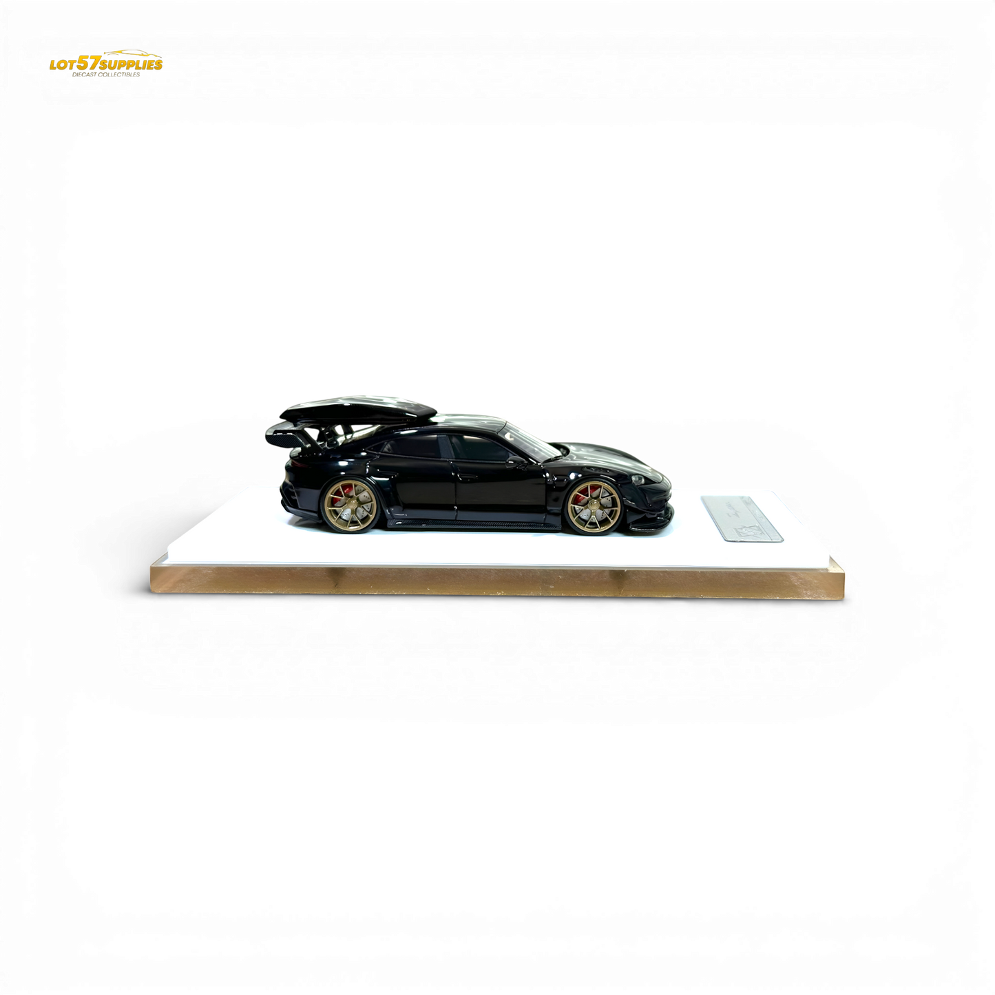Diecast Porsche Taycan 1:64 scale model with roof box in black, detailed miniature car from Lot57Supplies Diecast Shop.