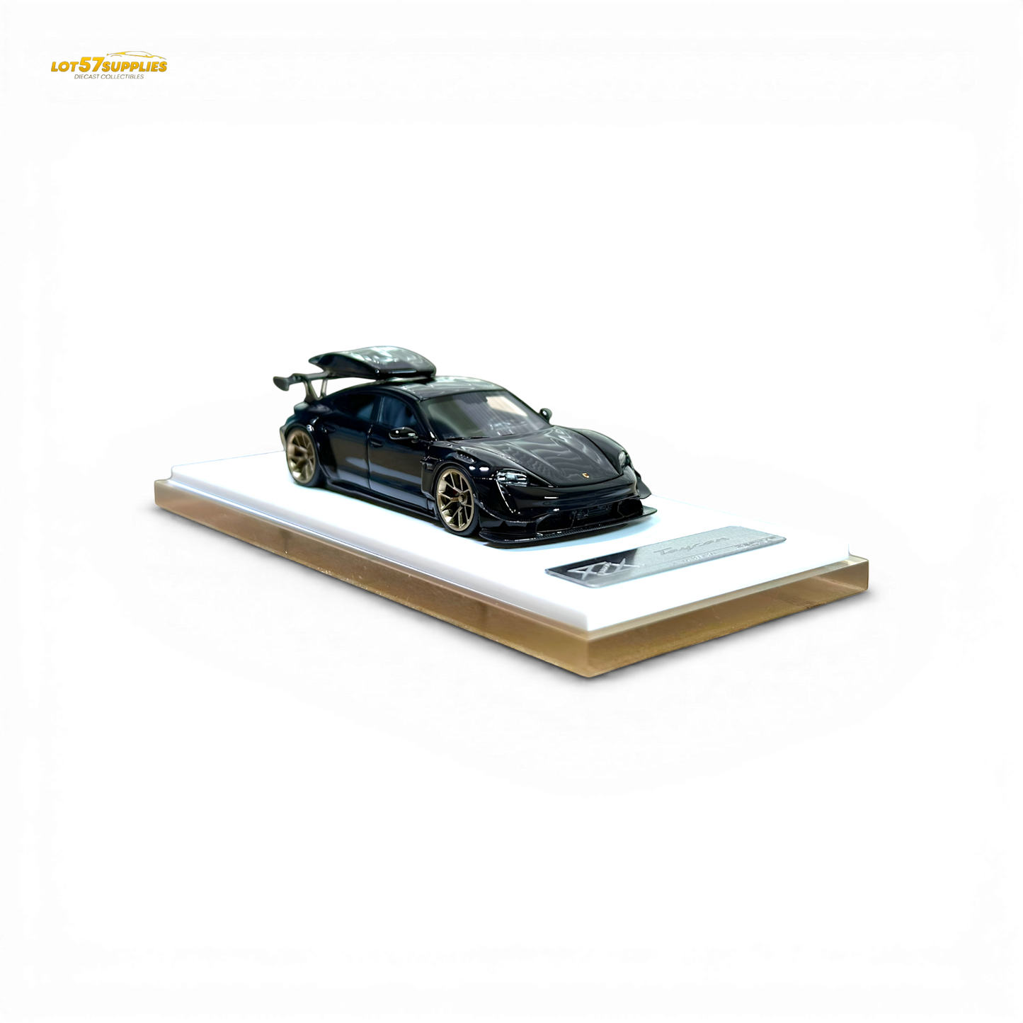 Black Porsche Taycan diecast model with roof box, 1:64 scale, detailed miniature car by Lot57Supplies Diecast Shop.