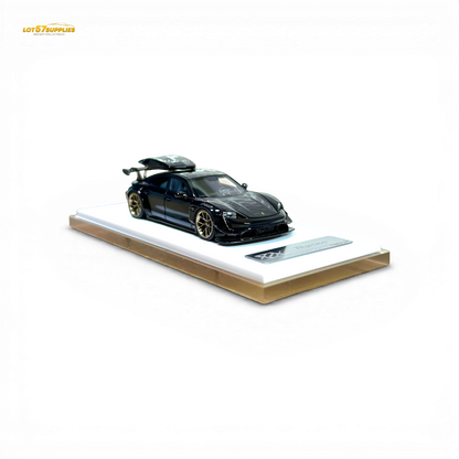 Black Porsche Taycan diecast model with roof box, 1:64 scale, detailed miniature car by Lot57Supplies Diecast Shop.