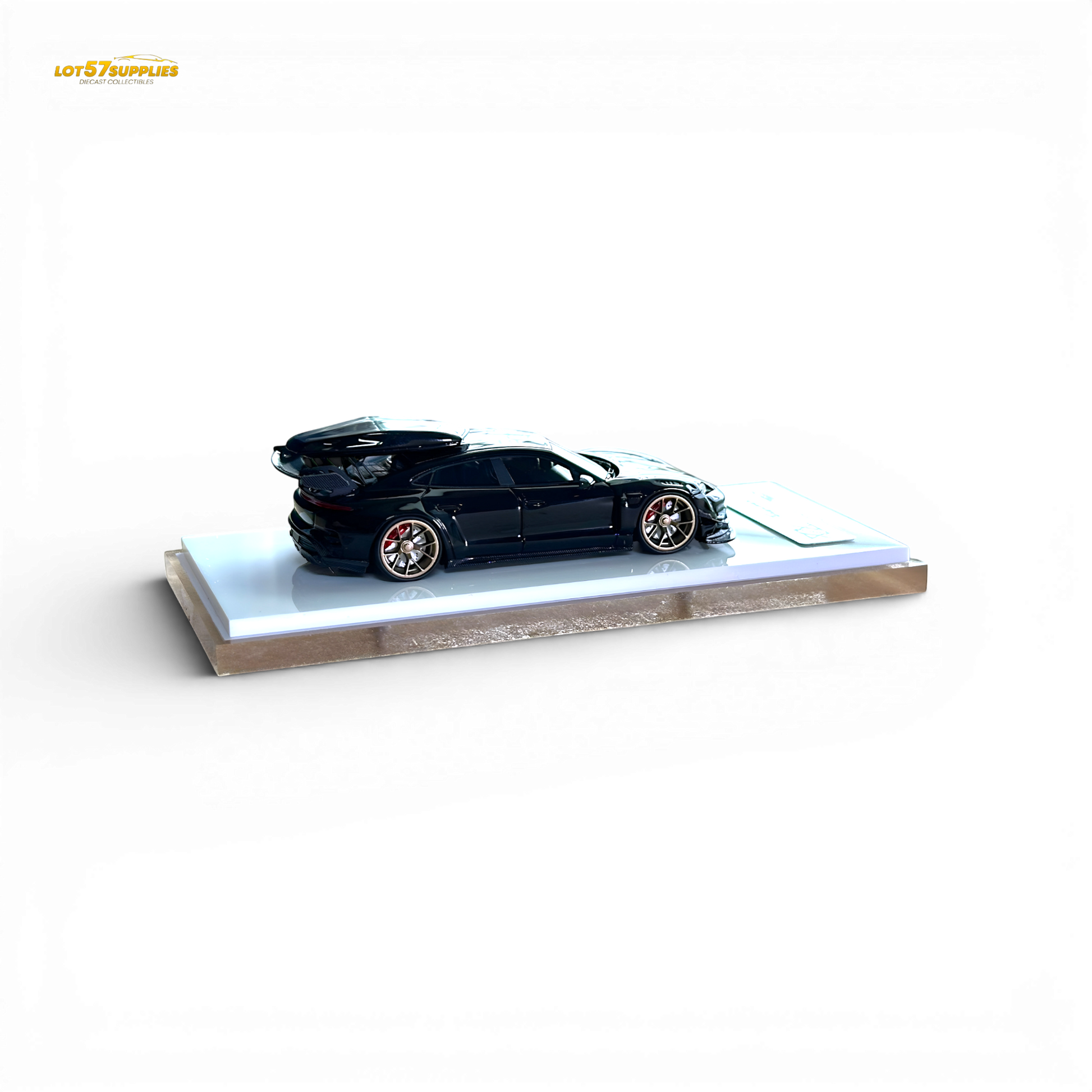 Diecast Porsche Taycan 1:64 scale model in black with roof box, detailed miniature replica from Lot57Supplies Diecast Shop