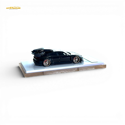 Diecast Porsche Taycan 1:64 scale model in black with roof box, detailed miniature replica from Lot57Supplies Diecast Shop