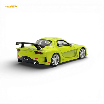 Green Mazda RX-7 VeilSide diecast model in 1:64 scale by Lot57Supplies Diecast Shop, showcasing detailed exterior features.