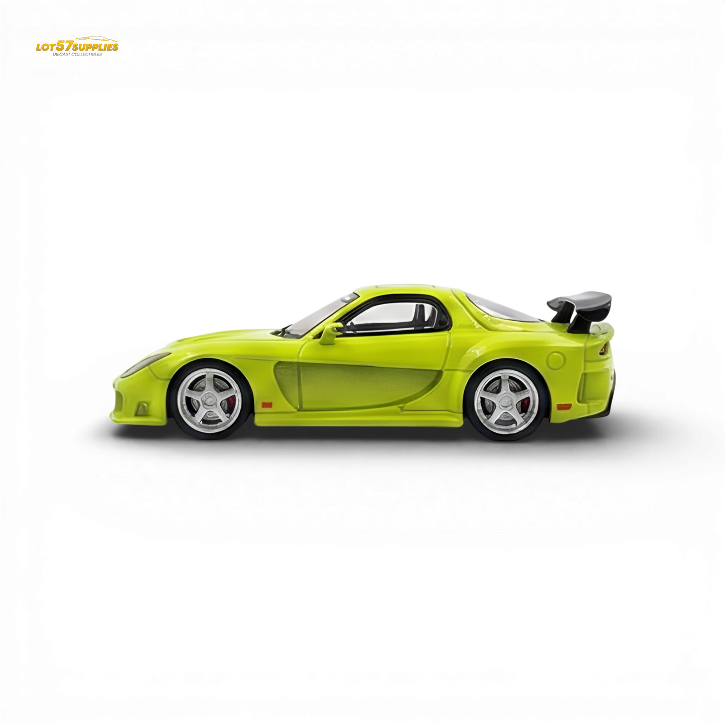 Green Mazda RX-7 VeilSide diecast model in 1:64 scale from Lot57Supplies, detailed miniature car with vibrant green finish.