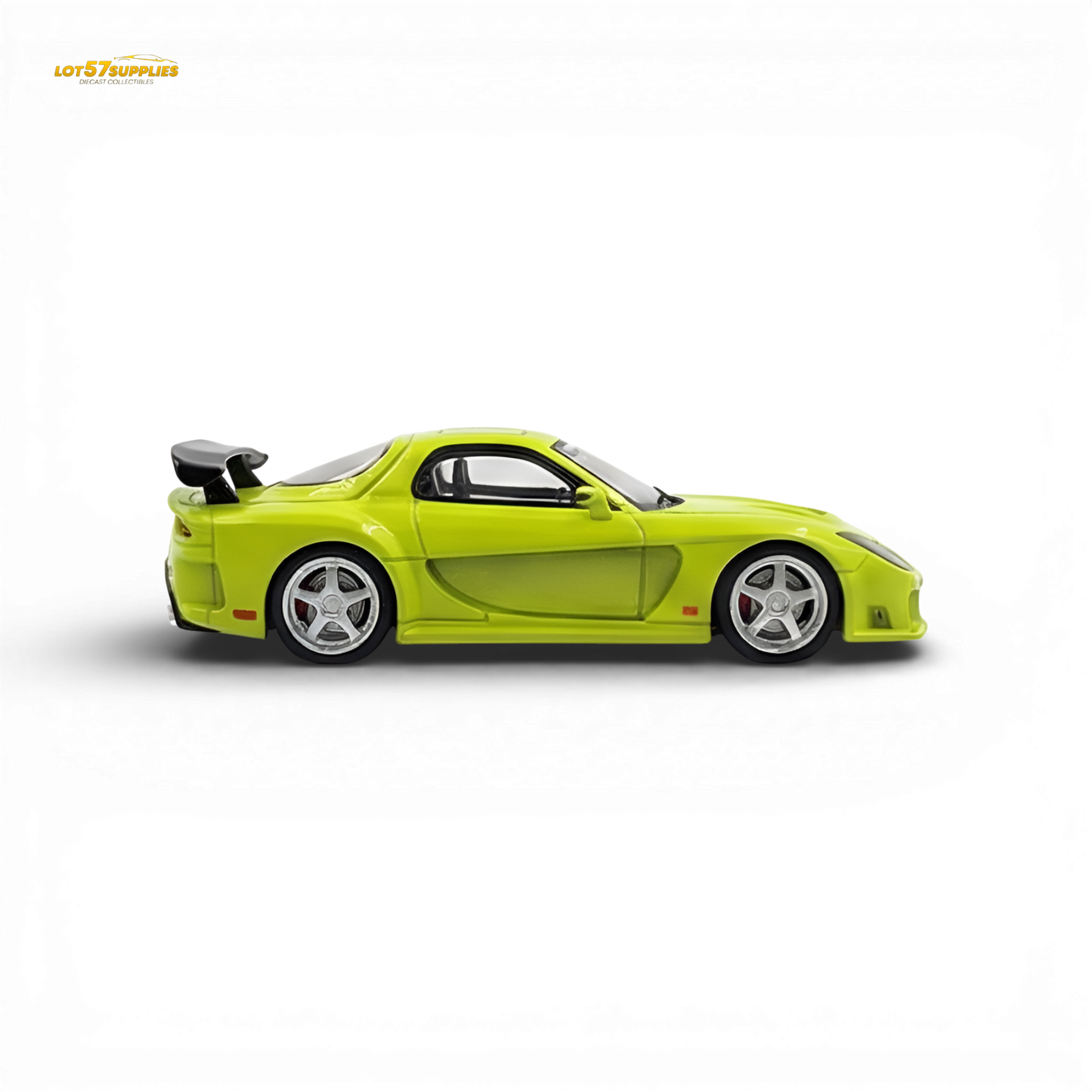 Green Mazda RX-7 VeilSide diecast model in 1:64 scale by Lot57Supplies Diecast Shop, detailed miniature collectible.