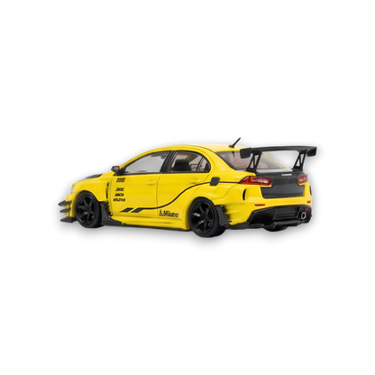 Yellow Mitsubishi Evolution X 1:64 diecast model with widebody kit by Varis, detailed scale collectible from Lot57Supplies Diecast Shop.