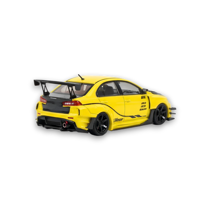 Yellow Mitsubishi Evolution X 1:64 diecast model with widebody kit from Lot57Supplies, detailed miniature car.