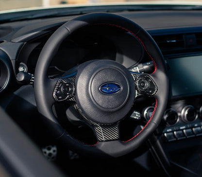 OLM LE dry carbon fiber steering wheel trim for Subaru BRZ and Toyota GR86