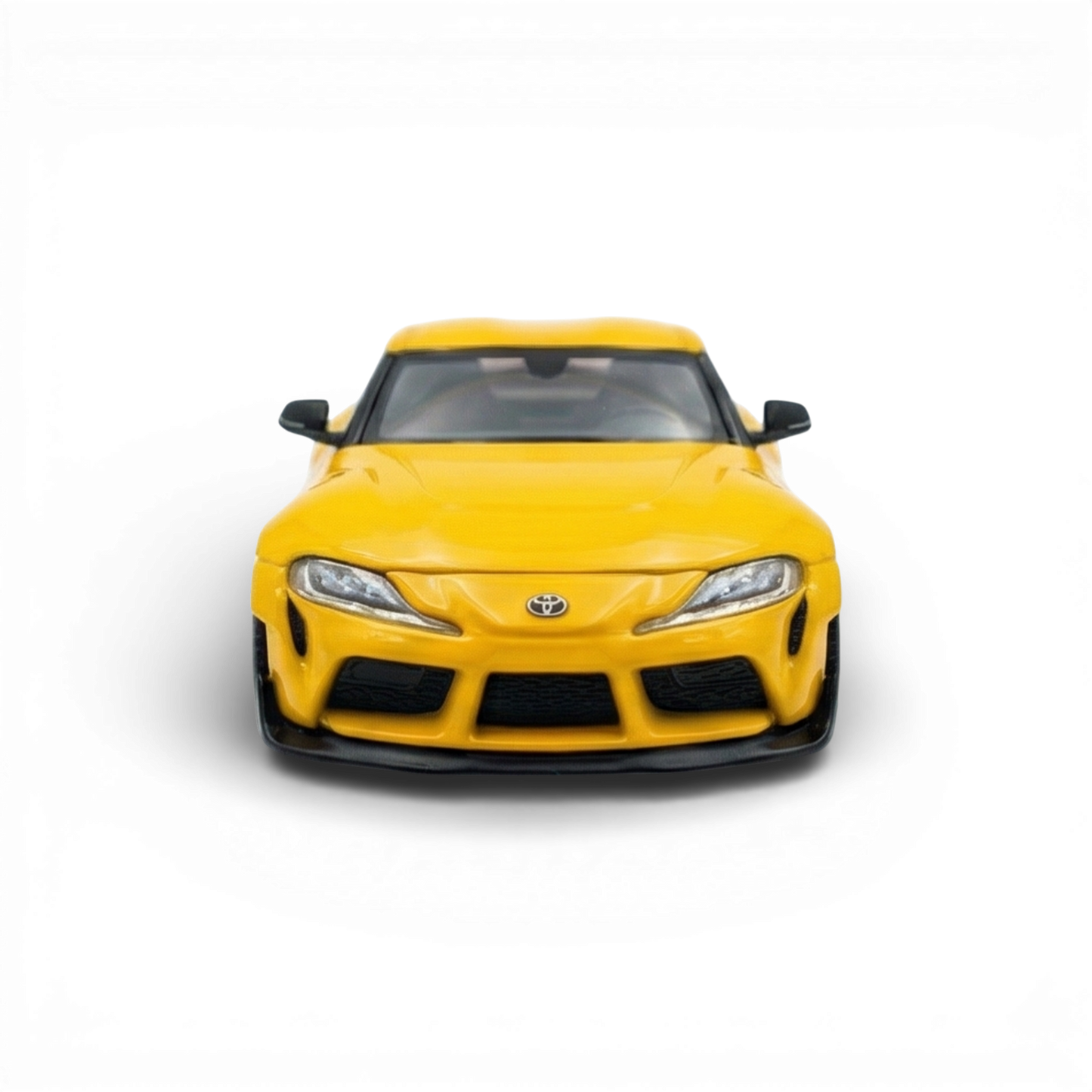 Yellow 1:64 scale Toyota Supra GR diecast model from Lot57Supplies Diecast Shop, detailed toy car with realistic features.