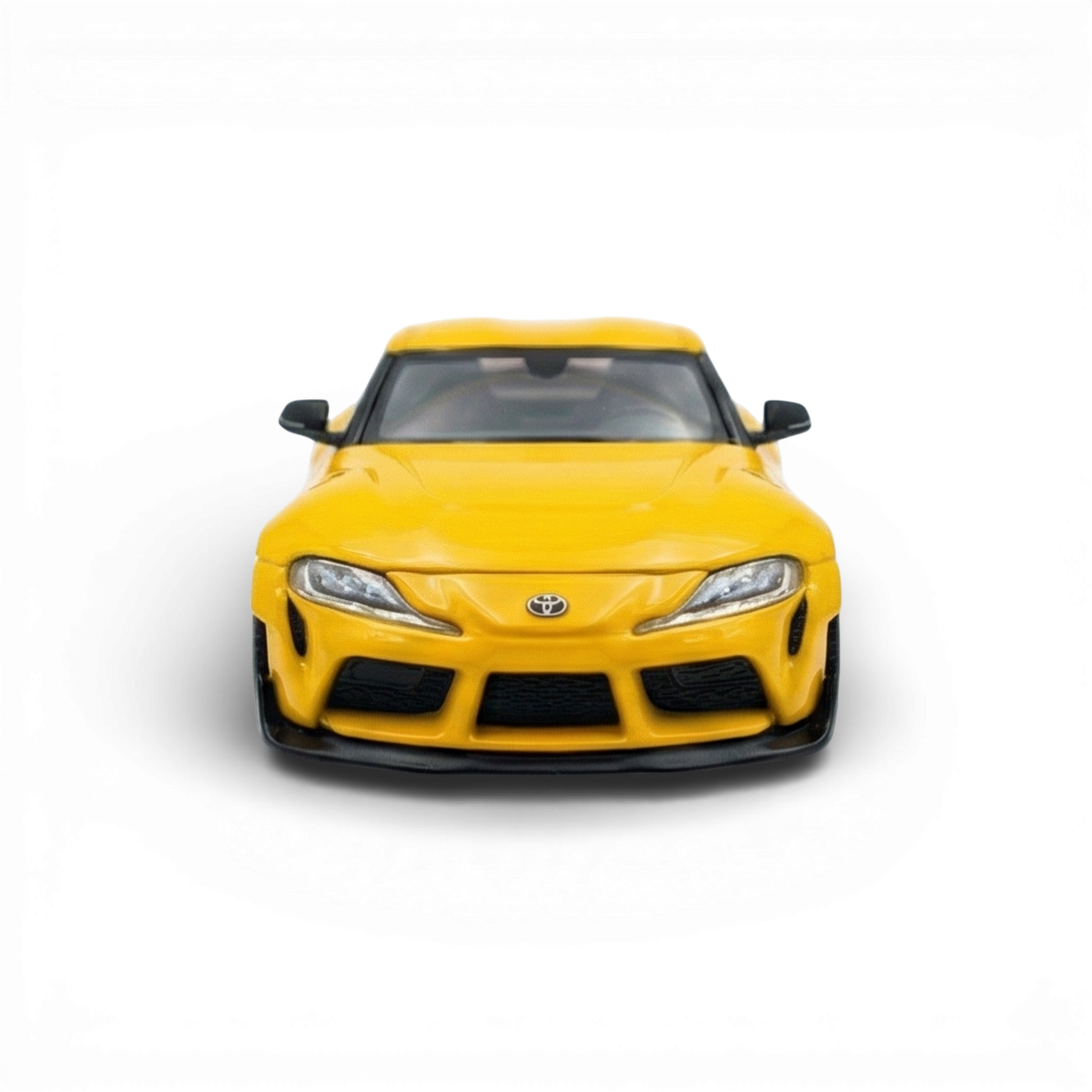 Yellow 1:64 scale Toyota Supra GR diecast model from Lot57Supplies Diecast Shop, detailed toy car with realistic features.