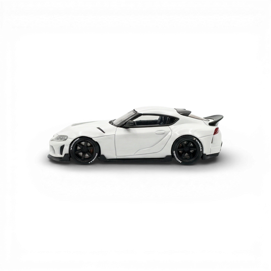 White 1:64 scale Toyota Supra GR diecast car by Lot57Supplies Diecast Shop, detailed model with realistic features.
