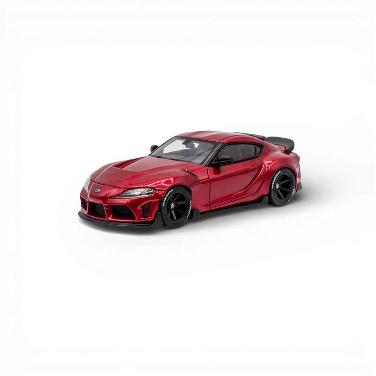 Toyota Supra GR diecast model in metallic red, 1:64 scale by Lot57Supplies Diecast Shop, detailed vehicle toy with realistic finish.