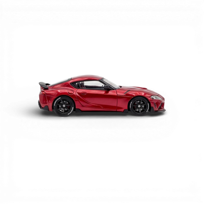 Metallic red 1:64 Toyota Supra GR diecast model by Lot57Supplies, detailed scale replica with realistic features.