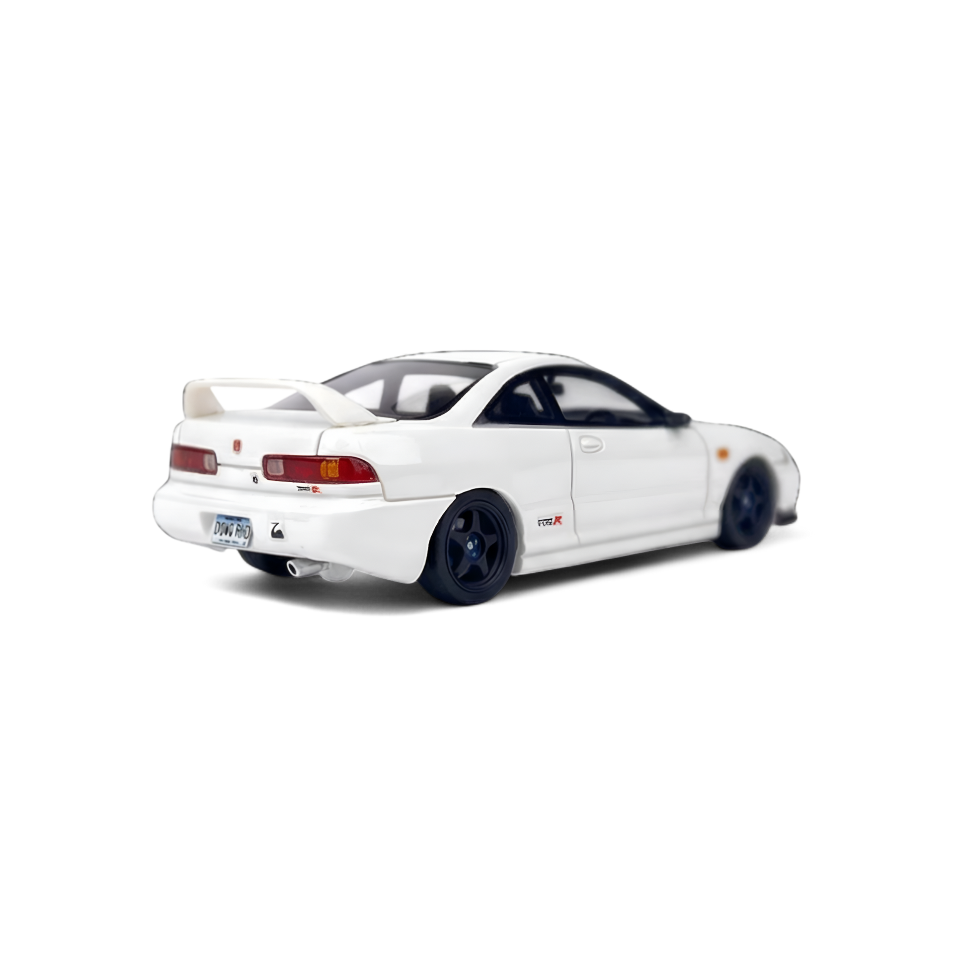 White Honda Integra DC2 diecast model in 1:64 scale by Lot57Supplies, detailed resin replica of classic Honda car.
